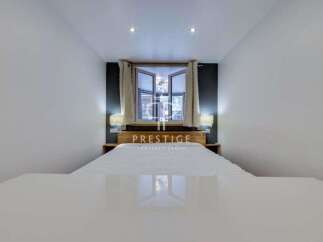 Discover a modern bedroom with a sleek design.
