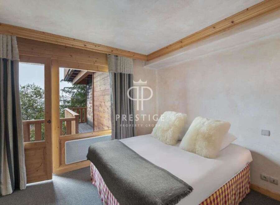 Discover the charm of this cozy bedroom with a stunning view.