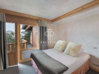 Discover the charm of this cozy bedroom with a stunning view.
