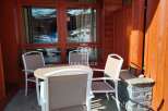 Enjoy the stunning mountain views from this charming outdoor seating area.