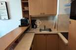 Discover a compact yet functional kitchen space, perfect for efficient living.