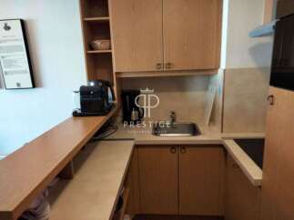 Discover a compact yet functional kitchen space, perfect for efficient living.