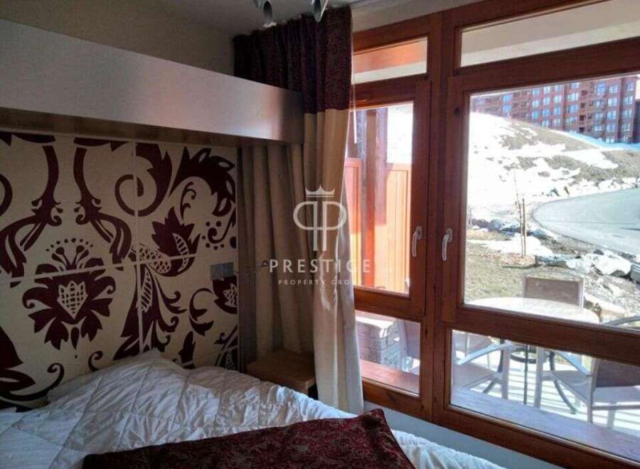 Discover a cozy bedroom with stunning views.