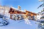 Discover a stunning chalet nestled in a winter wonderland.