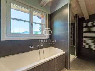 Discover luxury living in this stunning property! Enjoy breathtaking views from the large windows, perfect for relaxation.