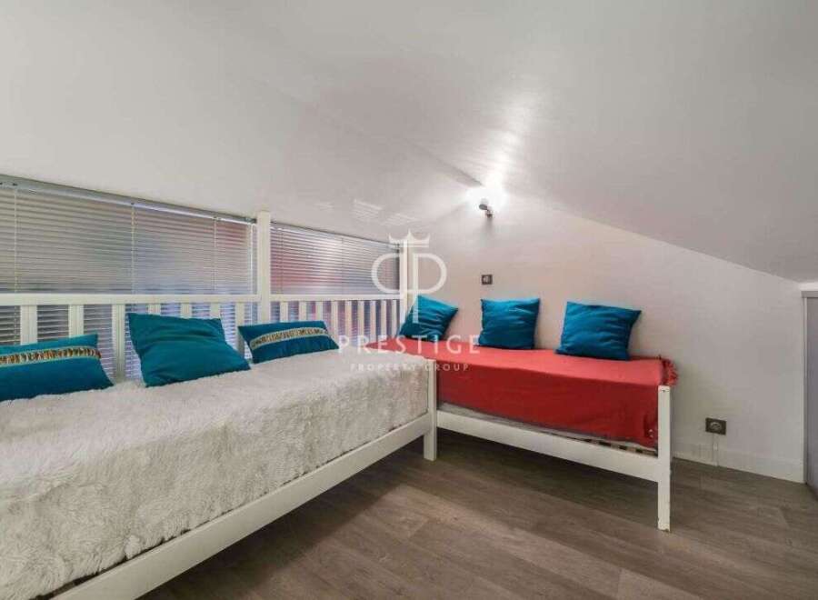 Discover a cozy loft space perfect for relaxation.