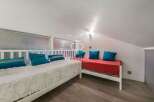 Discover a cozy loft space perfect for relaxation.