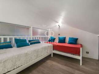 Discover a cozy loft space perfect for relaxation.