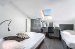 Discover a stylish bedroom with a modern design.