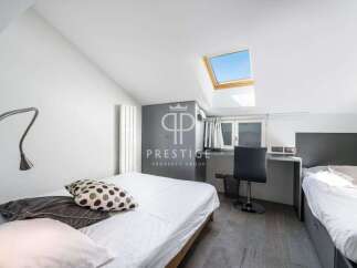 Discover a stylish bedroom with a modern design.