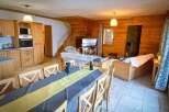 Discover the charm of this cozy property, featuring a warm wooden interior and a welcoming atmosphere.