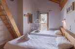 Cozy bedroom with two twin beds, perfect for a comfortable stay.
