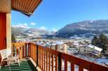 Enjoy breathtaking mountain views from this charming balcony.
