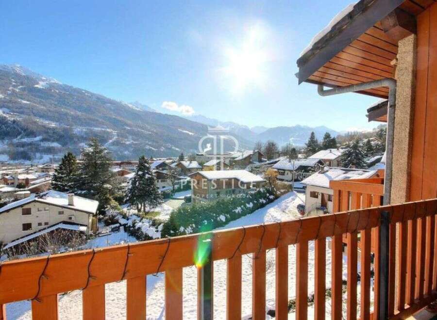 Enjoy breathtaking mountain views from this charming property.