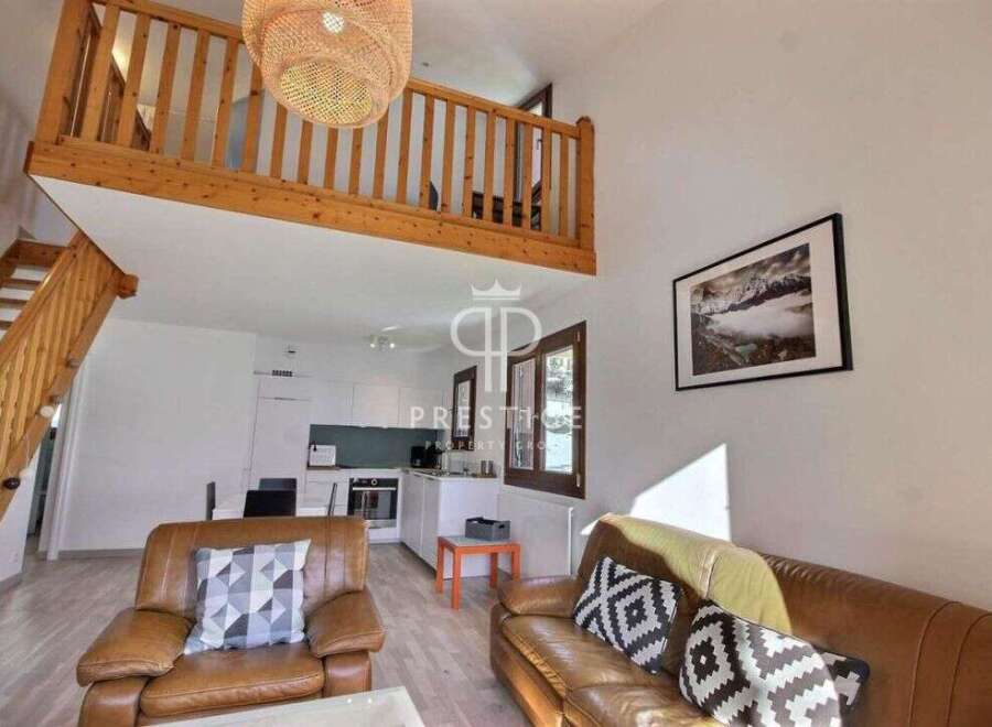 Discover this stunning property featuring a unique mezzanine level, perfect for additional living space or a cozy retreat.