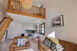 Discover this stunning property featuring a unique mezzanine level, perfect for additional living space or a cozy retreat.