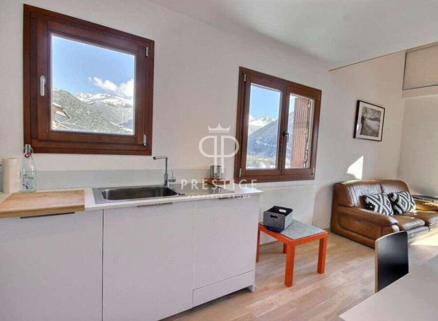 Discover stunning mountain views from this charming property.