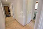Discover this stunning property featuring a bright and airy hallway with beautiful wooden floors.