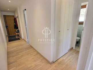 Discover this stunning property featuring a bright and airy hallway with beautiful wooden floors.