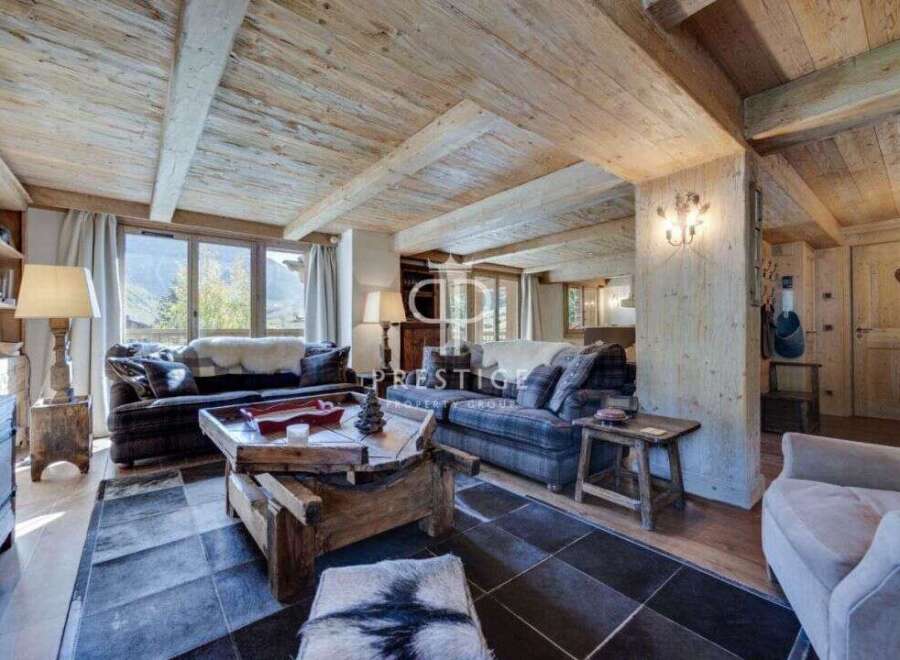 Experience rustic elegance in this stunning property, featuring exposed wooden beams and a cozy ambiance.