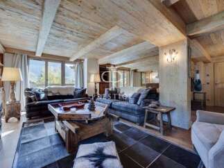 Experience rustic elegance in this stunning property, featuring exposed wooden beams and a cozy ambiance.
