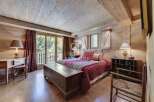Experience rustic charm in this cozy bedroom.