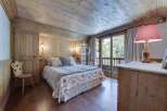 Experience rustic charm in this cozy bedroom.