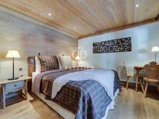 Experience rustic charm in this cozy bedroom.