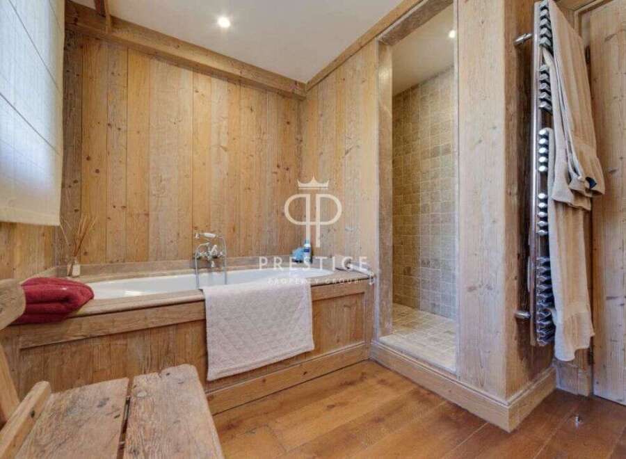 Experience rustic luxury in this stunning bathroom.