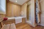 Experience rustic luxury in this stunning bathroom.