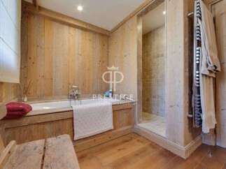 Experience rustic luxury in this stunning bathroom.