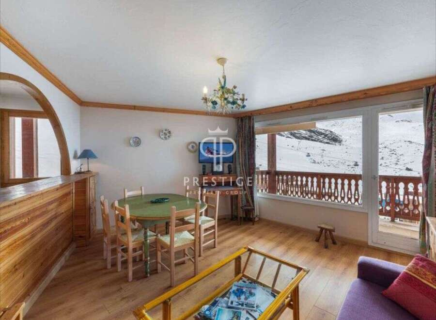 Experience the charm of this cozy apartment with stunning mountain views.