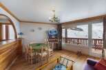 Experience the charm of this cozy apartment with stunning mountain views.