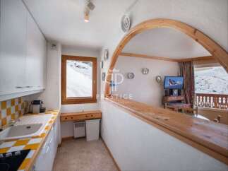 Discover a charming ski chalet with stunning mountain views.