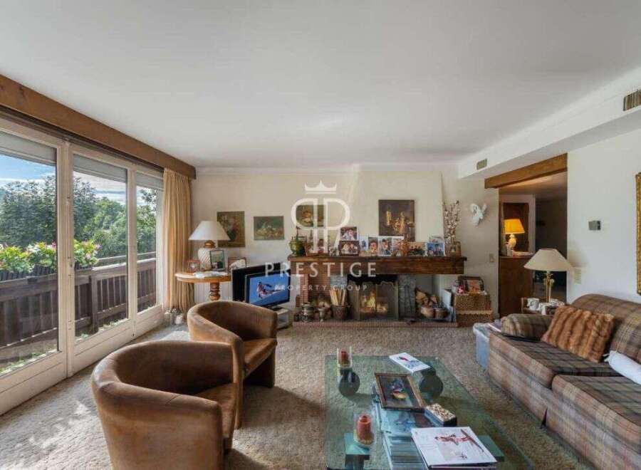 Discover a cozy living space with a stunning view.