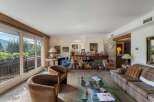 Discover a cozy living space with a stunning view.