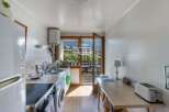 Discover a charming kitchen with a bright and airy feel, perfect for preparing delicious meals.