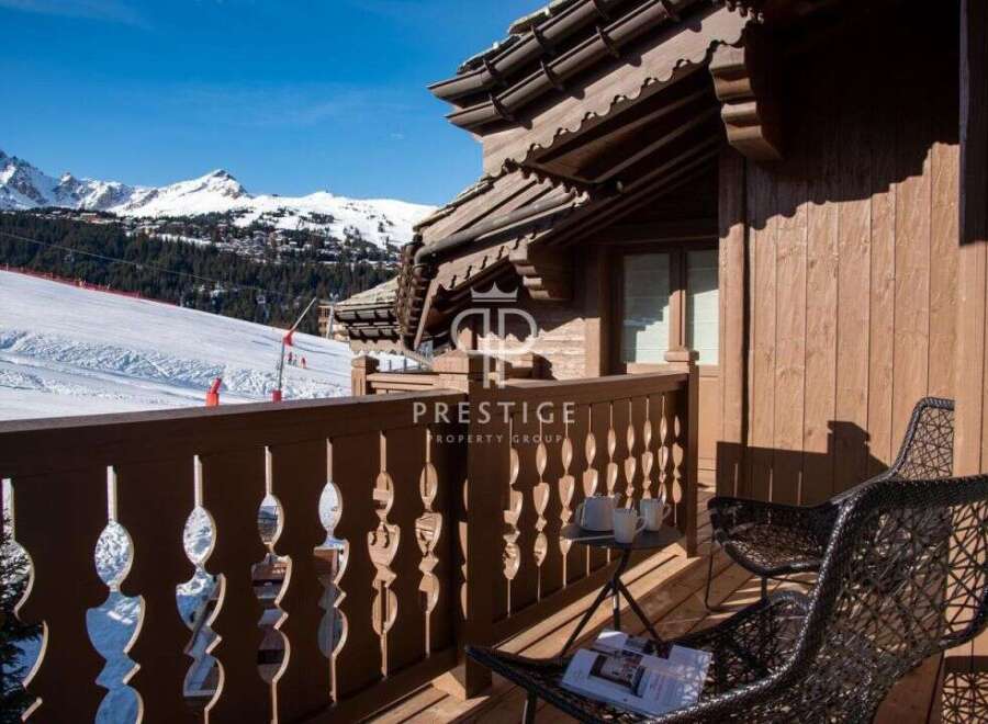 Enjoy breathtaking mountain views from this luxurious chalet.