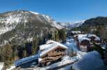 Experience luxury living in this stunning chalet nestled in the heart of the mountains.