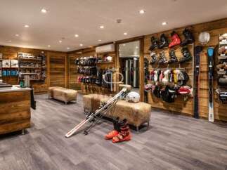 Step into a stylish ski shop with a warm, inviting ambiance.