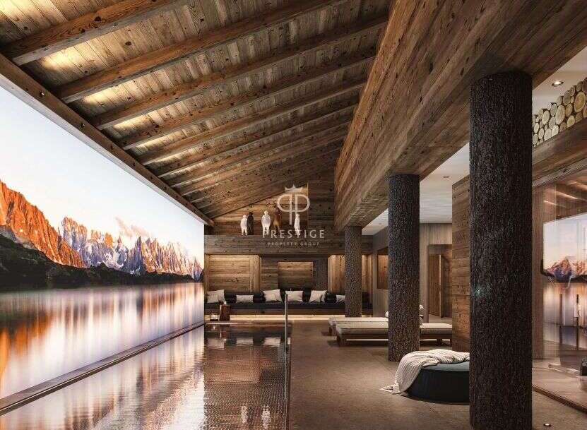 Experience luxury living in this stunning property featuring a breathtaking indoor pool with a mountain view backdrop.