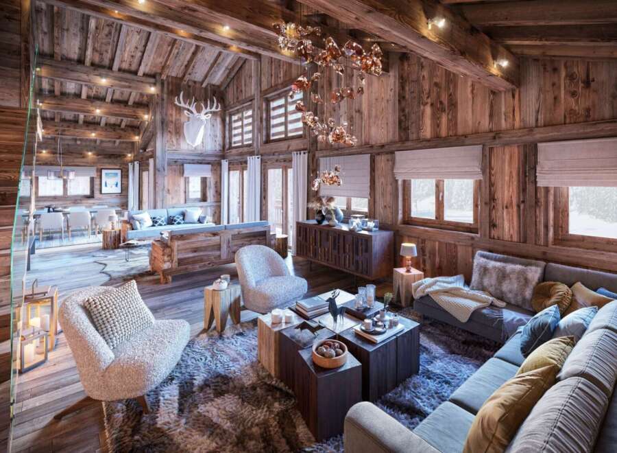 This stunning chalet boasts a spacious open-plan living area with exposed wooden beams and a cozy fireplace, perfect for relaxing after a day on the slopes.