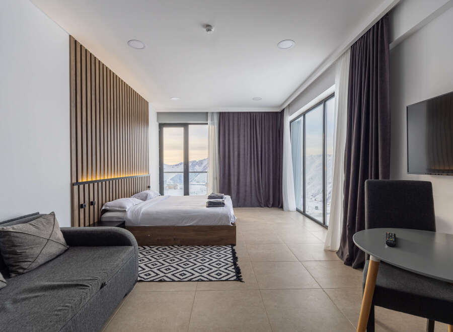 Experience luxury in this stunning apartment with breathtaking mountain views.