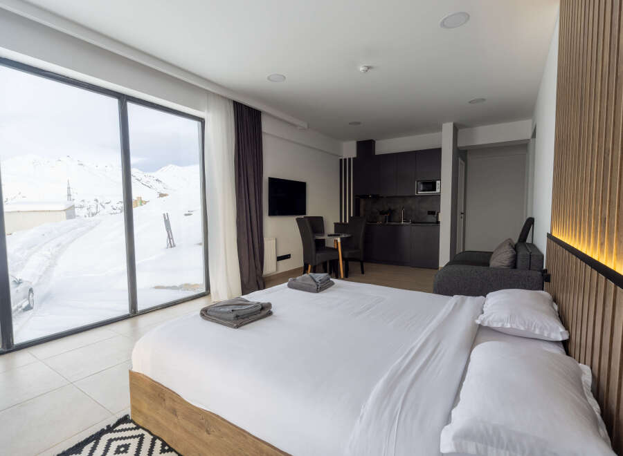 Experience luxury in this stunning apartment with breathtaking mountain views.