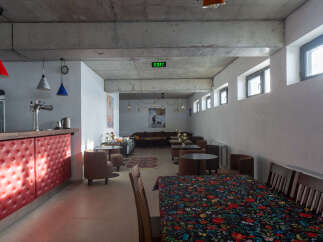 This unique property features a spacious interior with a modern design.