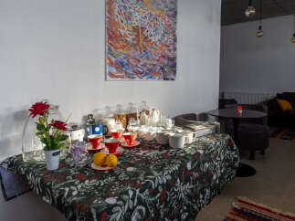 This charming property features a cozy breakfast nook, perfect for enjoying a morning coffee or tea.