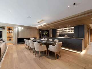 Experience luxury living in this stunning property, featuring a modern kitchen with sleek countertops and ample storage.
