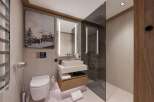 Step into luxury with this stunning bathroom featuring a modern design and high-end finishes.