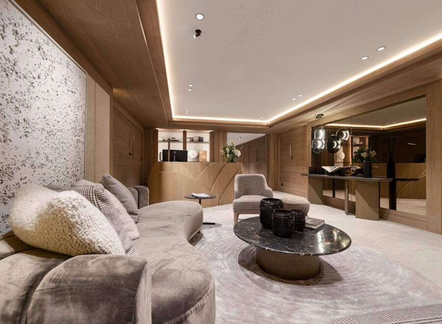 Step into luxury with this stunning living space, featuring exquisite wood paneling and a modern design.
