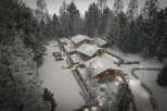 Discover your dream winter escape in this stunning snow-covered chalet community.